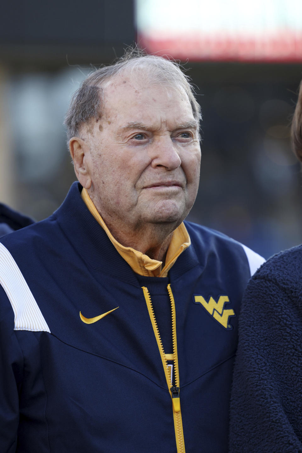 Former West Virginia head coach Don Nehlen is honored during the first half of an NCAA college football game against Cincinnati, Saturday, Nov. 18, 2023, in Morgantown, W.Va. (AP Photo/Chris Jackson)