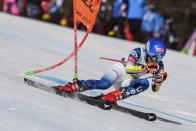 United States' Mikaela Shiffrin speeds down the course during a women's giant slalom, at the alpine ski World Championships, in Cortina d'Ampezzo, Italy, Thursday, Feb. 18, 2021. (AP Photo/Giovanni Auletta)