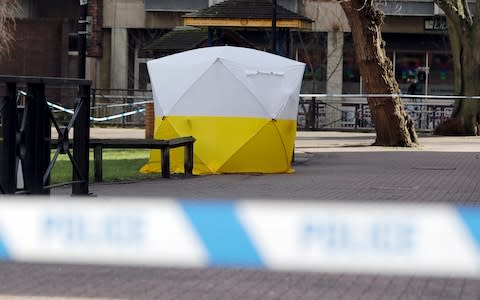 A police tent covers the spot where Sergei Skripal and his daughter collapsed in Salisbury - Credit: Frank Augstein /AP