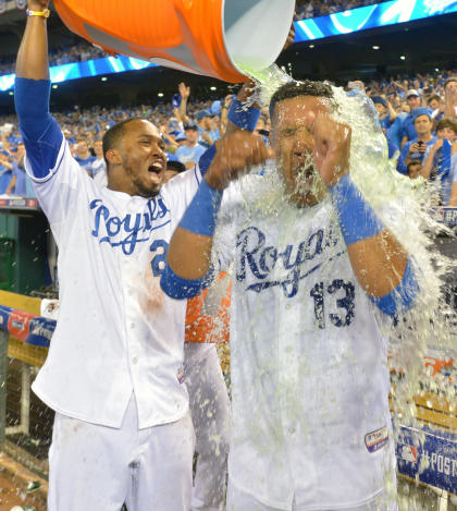 Salvador Perez (right) was 0 for 5 before his winning hit. (USA Today)