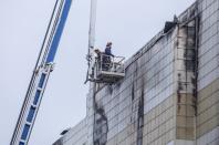 <p>Firefighters work at the scene of the multistory shopping center after a fire, in the Siberian city of Kemerovo, about 3,000 kilometers (1,900 miles) east of Moscow, March 26, 2018. (Photo: AP) </p>