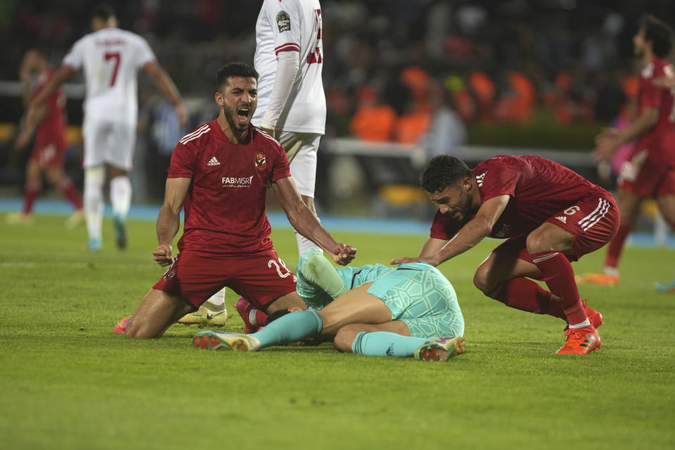 Al Ahly players celebrate after winning the CAF Champions League final soccer match between Morocco's Wydad Athletic Club and Egypt's Al Ahly SC, at the Mohammed V stadium, in Casablanca, Morocco, Sunday, June 11, 2023. (AP Photo/Mosa'ab Elshamy)