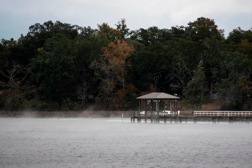 Cold air blows off the water at Fort Bayou in Ocean Springs on Tuesday, Jan. 16, 2024. Freezing rain covered plants and roads with icy overnight as temperatures dipped below freezing.