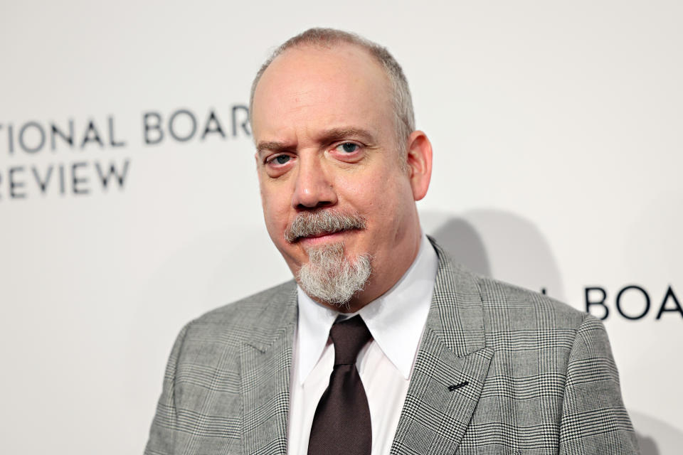 Paul Giamatti was one of the top contenders to receive a nod for his performance in The Holdovers. However, it sounds like he wasn’t at all fazed by the buzz. “I have to admit, I was asleep,” he told the Hollywood Reporter yesterday, revealing that it was his manager who woke him up once the nominations had been announced. “I’m a night owl. I stay up late. I think I was like, ‘I’m just going to ignore these things. Somebody will tell me what happened.’”Paul said he was totally “flabbergasted” by the nom and it wasn’t long before his phone started blowing up with congratulatory messages. “I didn’t need to call anybody,” he said. “Everybody started calling me. I was like, ‘Holy cow.’”