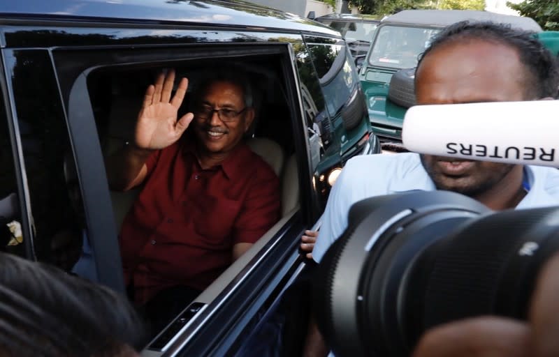 President-elect Gotabaya Rajapaksa waves at his supporters in Colombo