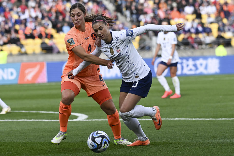 United States' Alex Morgan, right, and Netherlands' Aniek Nouwen battle for the ball during the Women's World Cup Group E soccer match between the United States and the Netherlands in Wellington, New Zealand, Thursday, July 27, 2023. (AP Photo/Andrew Cornaga)