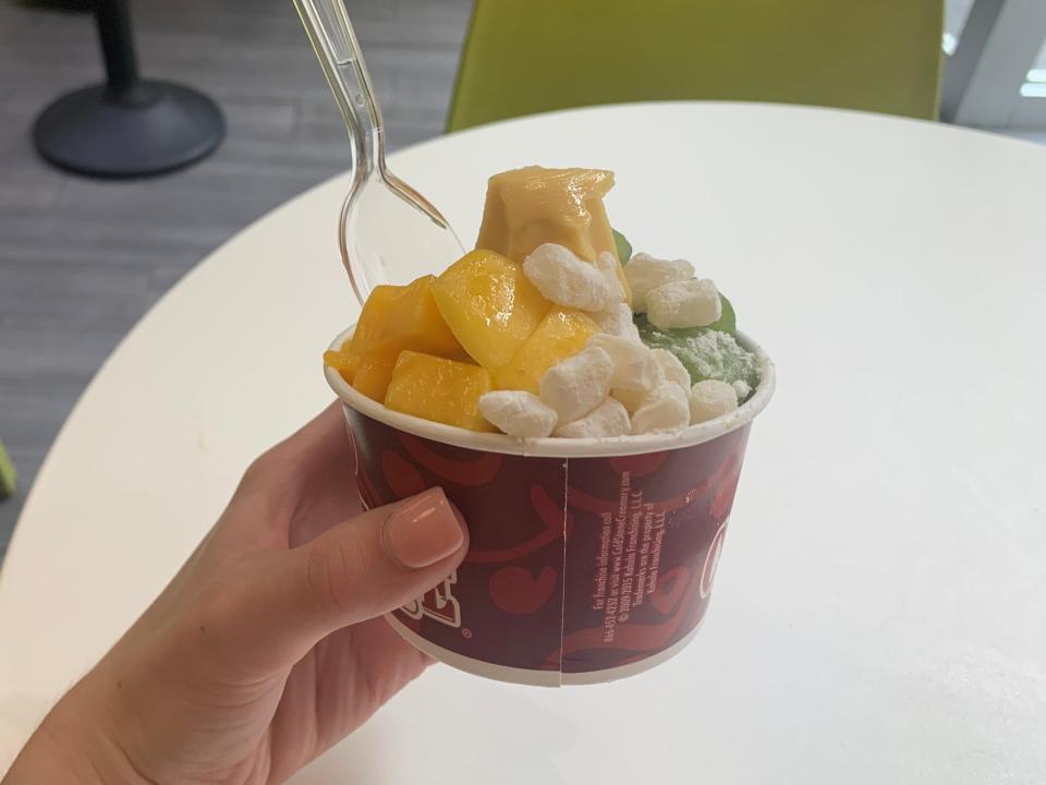 A small mango frozen yogurt from Pinkberry.