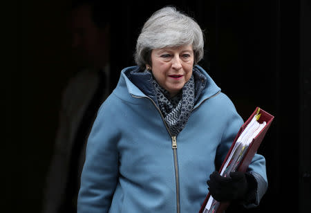 Britain's Prime Minister Theresa May is seen outside Downing Street in London, Britain, February 13, 2019. REUTERS/Hannah McKay