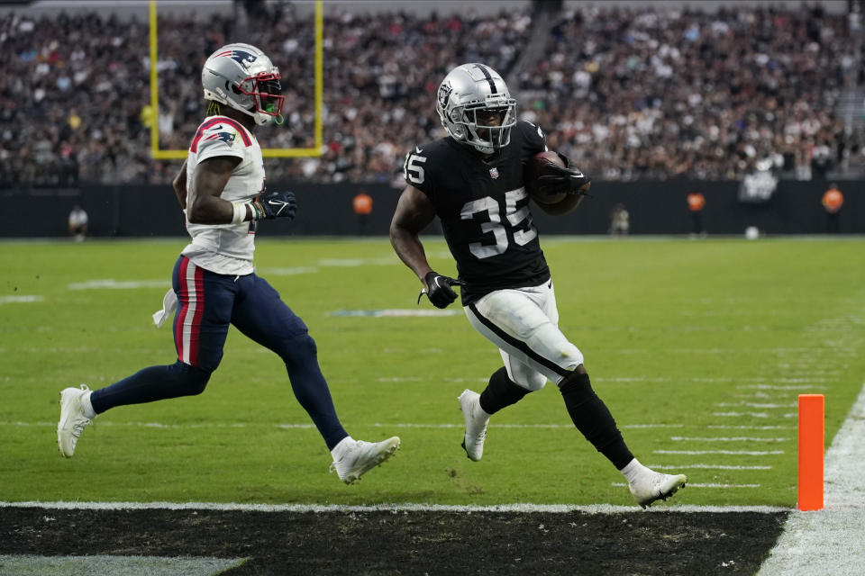 Las Vegas Raiders running back Zamir White (35) runs in for a touchdown during the first half of an NFL preseason football game, Friday, Aug. 26, 2022, in Las Vegas. (AP Photo/John Locher)