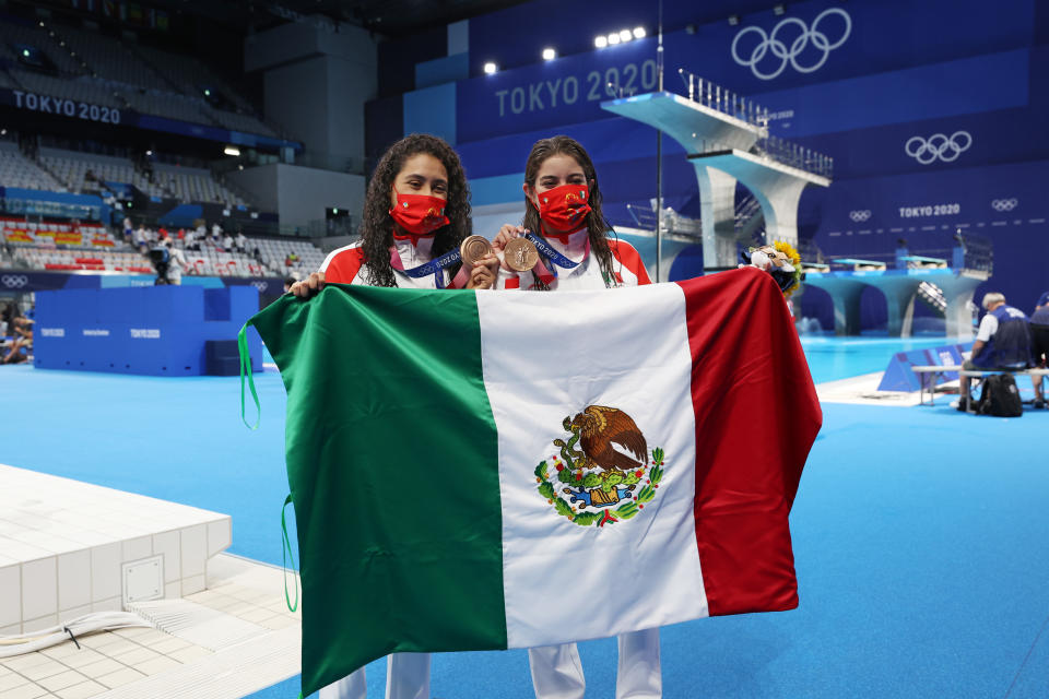 TOKYO, JAPAN - JULY 27: Bronze medalists Alejandra Orozco Loza and Gabriela Agundez Garcia of Team Mexico pose after the medal ceremony for the Women's Synchronised 10m Platform Final on day four of the Tokyo 2020 Olympic Games at Tokyo Aquatics Centre on July 27, 2021 in Tokyo, Japan. (Photo by Tom Pennington/Getty Images)