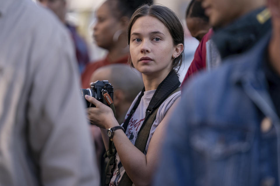 This image released by A24 shows Cailee Spaeny in a scene from "Civil War." (Murray Close/A24 via AP)