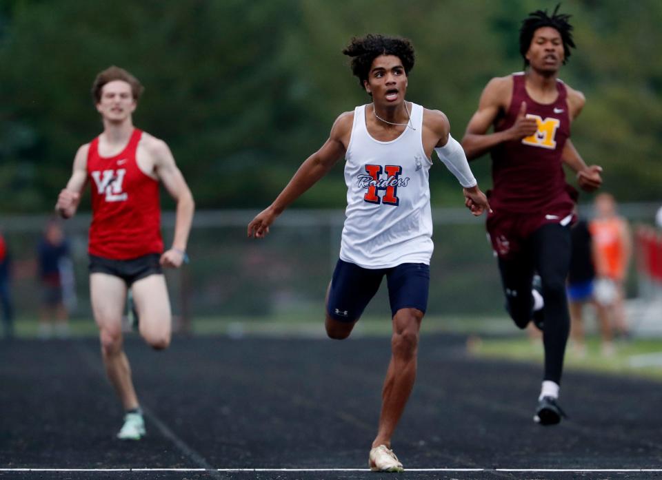 West Lafayette Daniel Schomer, Harrison Andres Negron-Carrero and McCutcheon Kris Kirtz race in the 400m dash during the IHSAA boy’s track and field sectional meet, Thursday, May 16, 2024, at West Lafayette High School in West Lafayette, Ind.