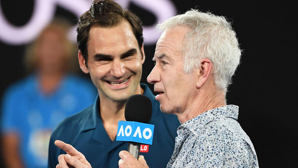 John McEnroe is seen here interviewing Roger Federer at the Australian Open.