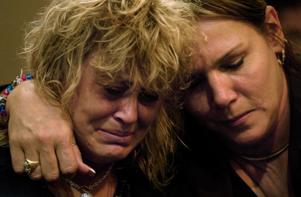 Susan Schorpen, left, mother of 11 year-old Carlie Brucia, weeps with Judy Cornett, a victim and advocate herself, as the verdict of guilty on all counts is read against Joseph Smith at the Sarasota County Judicial Center in Sarasota, Fla., Thursday, November 17, 2005. Joseph Smith was convicted for the abduction, rape, and killing of 11 year-old Carlie Brucia in February 2004 and faces the death penalty.