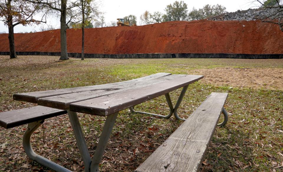 A bulldozer moves dirt on a project in Kentuck Park in Northport on Thursday, Nov. 30, 2023. The City of Northport and the Kentuck Festival are now at odds over a contract negotiation for future festivals.