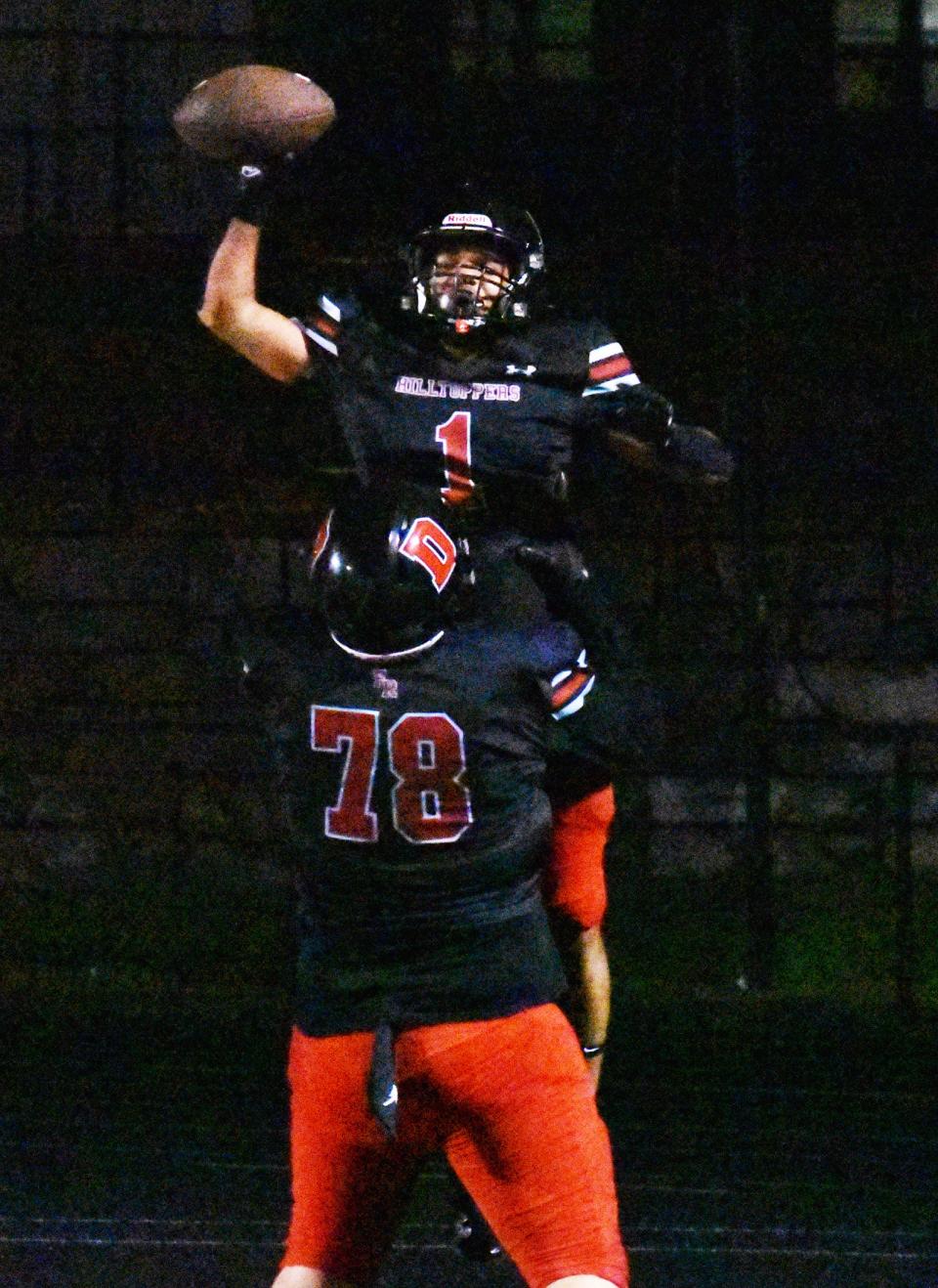 Durfee running back Eric Lucas celebrates a touchdown with Jayden Fernandes during Friday's non-league game against Nauset at B.M.C. Durfee High School Sept. 29, 2023