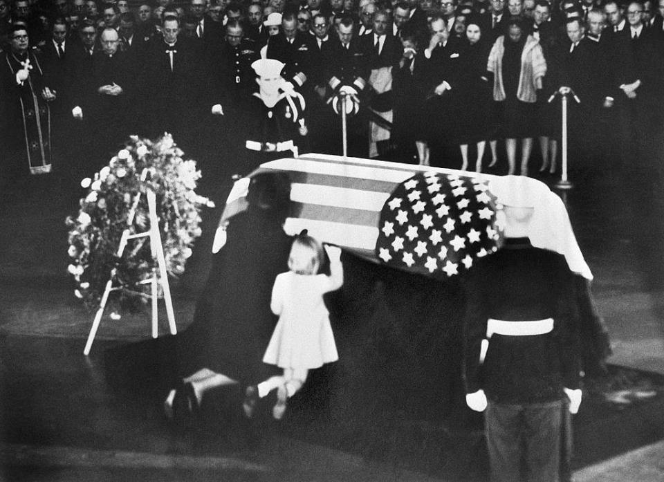 crowd surrounded the casket