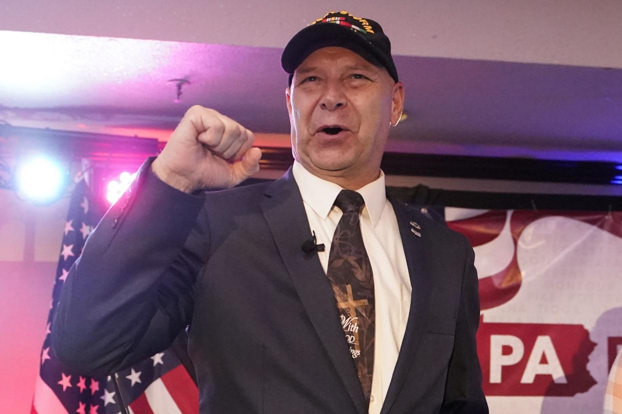 State Sen. Doug Mastriano the Republican candidate for governor of Pennsylvania, gestures to the crowd during his primary night election party in Chambersburg, Pa., May 17, 2022. 