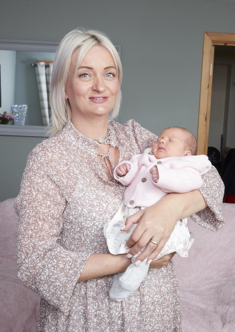 Alexis Brett pictured cradling her first daughter [Photo: Caters]