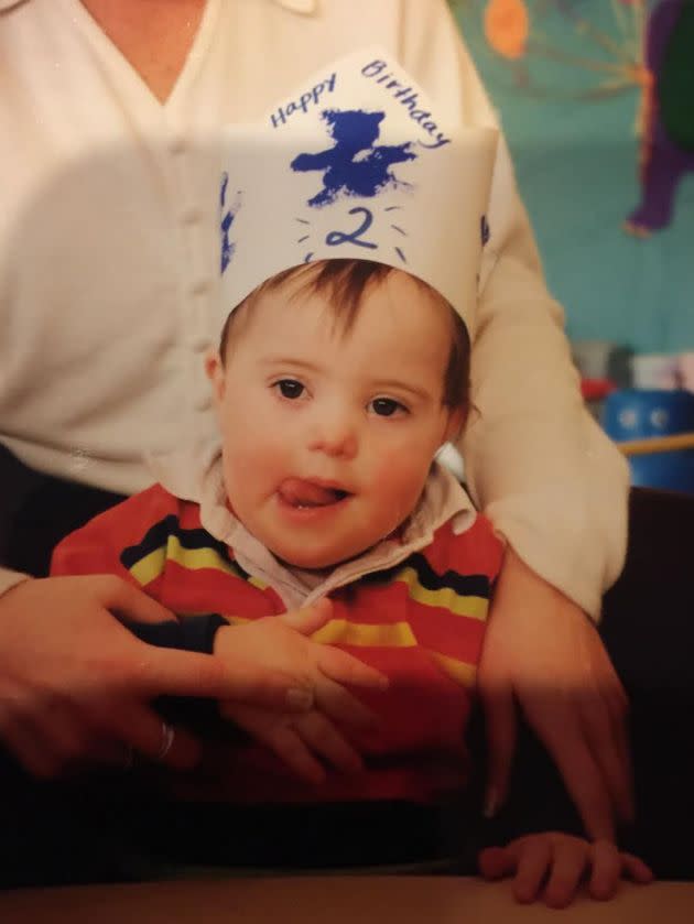 John celebrates his second birthday in 1998.