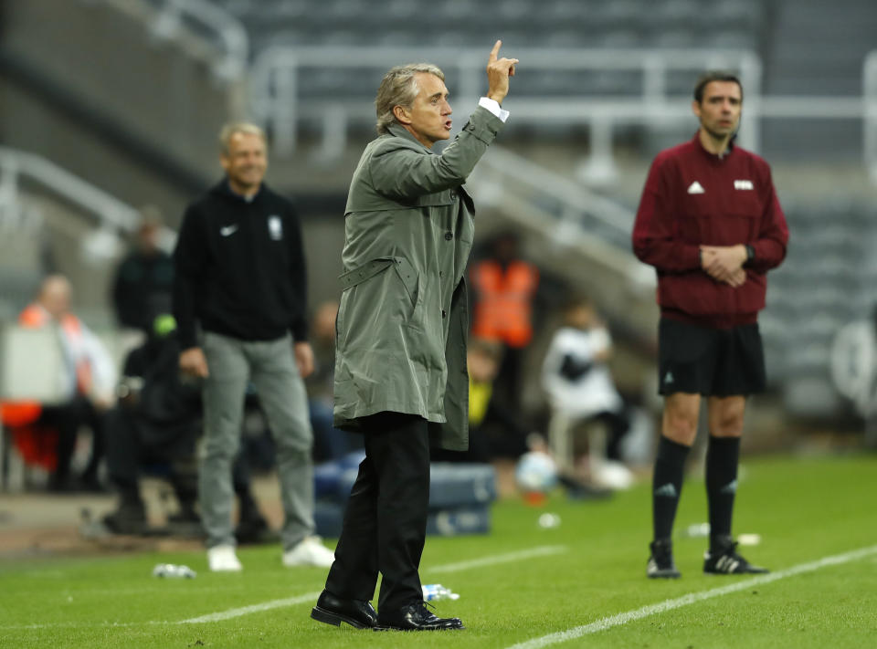 Saudi Arabia coach Roberto Mancini gives instructions during the international friendly soccer match against South Korea at St. James' Park, Newcastle upon Tyne, England, Tuesday Sept. 12, 2023. (Will Matthews/PA via AP)