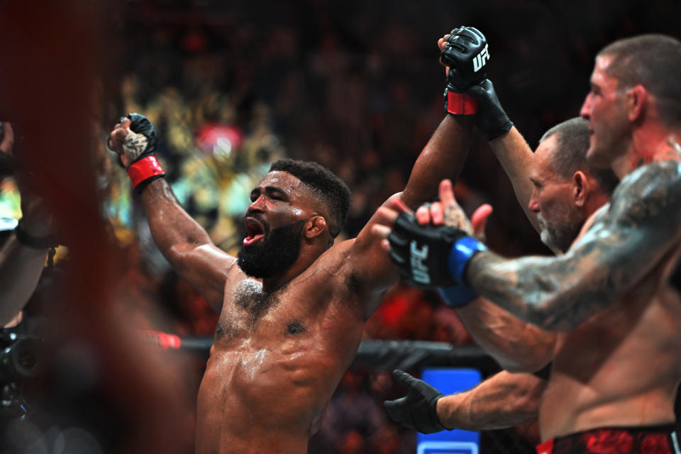 Jan 20, 2024; Toronto, Canada, USA; Chris Curtis (red glove) celebrates defeating Marc-Andre Barriault (blue gloves) during UFC 297 at ScotiaBank Arena. Mandatory Credit: Dan Hamilton-USA TODAY Sports