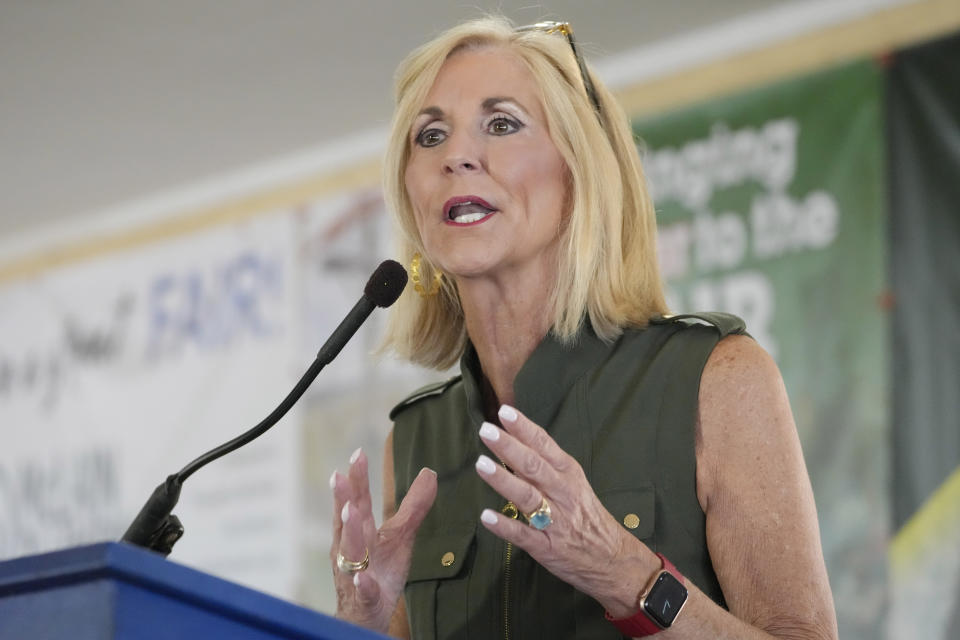 FILE - Mississippi Republican Attorney General Lynn Fitch addresses the crowd at the Neshoba County Fair in Philadelphia, Miss., Wednesday, July 26, 2023. Fitch's campaign says she strengthened workers' rights in the state by helping pass a law mandating equal pay for men and women. Fitch does not support the creation of a fair labor division. (AP Photo/Rogelio V. Solis, File)