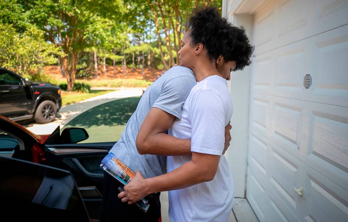 Nicole Stevenson embraces her son Jarin Stevenson as he departs for Tuscaloosa, Ala., on Wednesday, June 28, 2023 at their home in Chapel Hill, N.C. One week ago Stevenson, one of the top high school basketball players in North Carolina, announced he was reclassifying and committed to play for the University of Alabama.