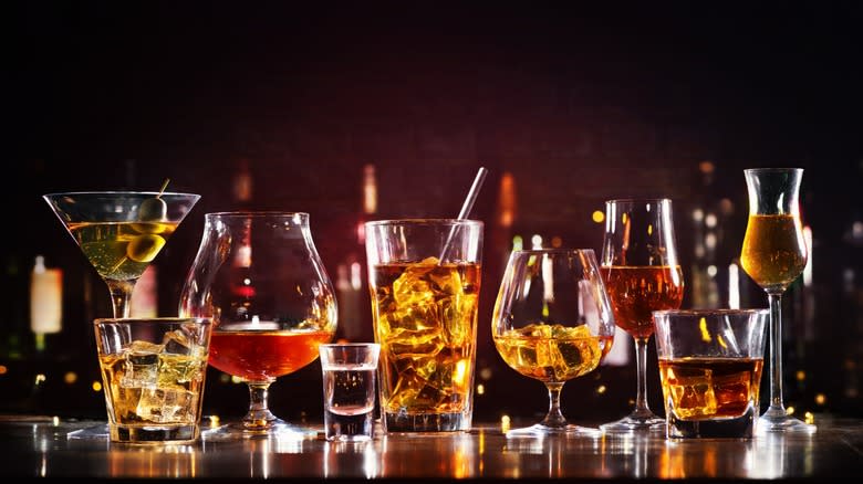 An assortment of cocktails in various types of glassware