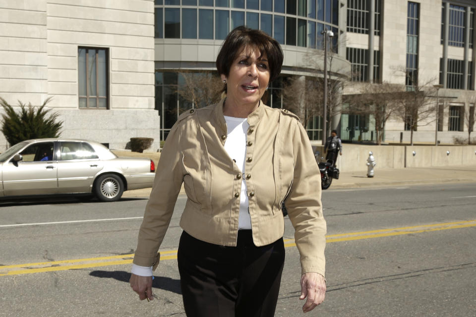 Former Arkansas Treasurer Martha Shoffner walks from the federal courthouse in Little Rock, Ark., during a break Monday, March 10, 2014. Shoffner faces 14 bribery and extortion counts and has pleaded not guilty. She resigned last year. (AP Photo/Danny Johnston)
