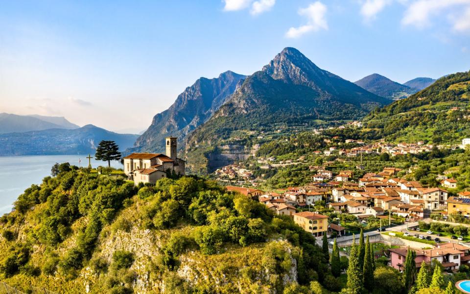 Eremo di San Pietro in Marone at Lake Iseo in Italy - Shutterstock