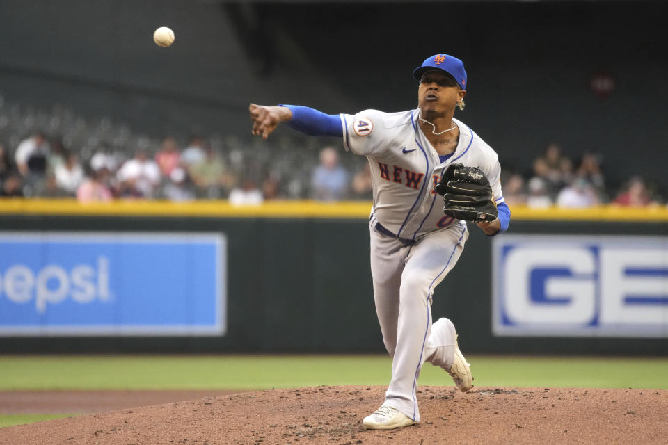 New York Mets pitcher Marcus Stroman throws against the Arizona Diamondbacks in the first inning of a baseball game, Tuesday, June 1, 2021, in Phoenix. (AP Photo/Rick Scuteri)