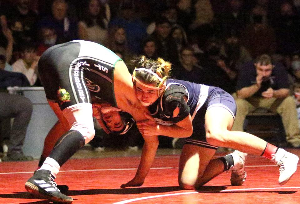 MMU's Jack Arpey (right) controls Ozzy Alsaid of St. Johnsbury during the 160 pound final at the State Championships on Sunday night at CVU. Arpey won the match to claim the 160 pound title.