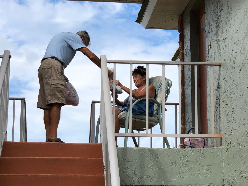 Staff and volunteers of Naples Senior Center distribute hot lunches to homebound seniors on Oct. 12, two weeks after Hurricane Ian slammed coastal Collier County with four feet of storm surge on Sept. 28, 2022.

Courtesy Naples Senior Center