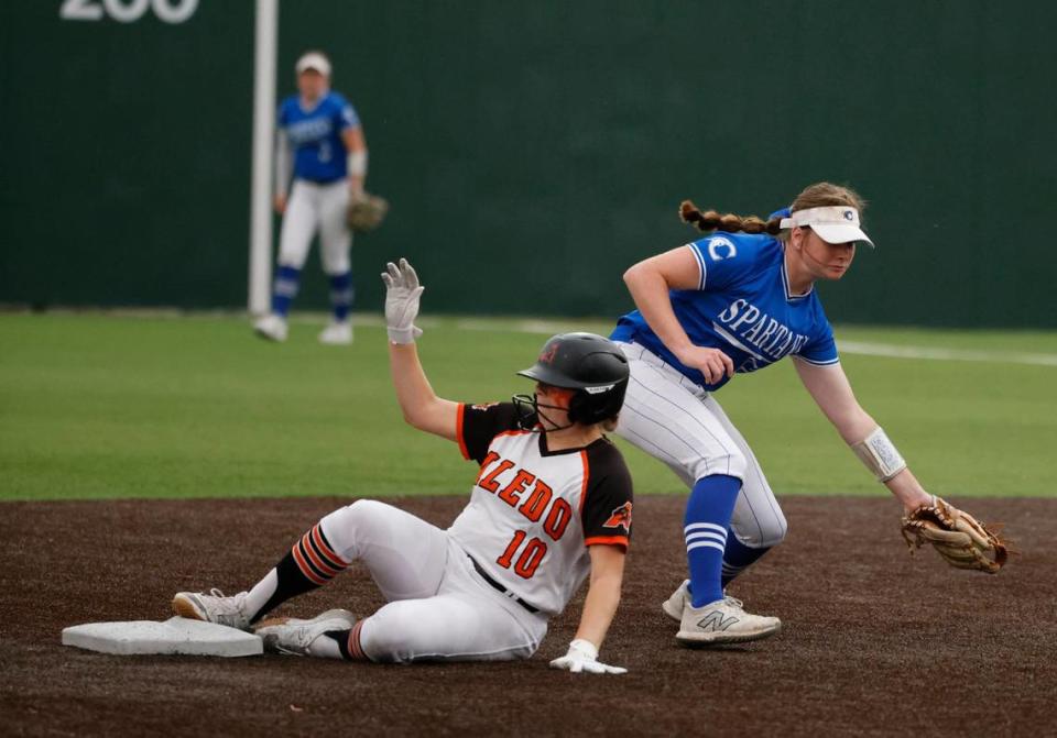 Aledo outfielder Grace Heath steals second under the throw to Centennial second baseman Madison Haynes during the UIL Conference 5A Region 1 final softball game at Aledo, Texas, Wednesday, May 22, 2024.