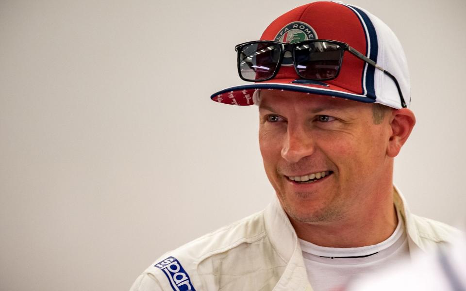 Alfa Romeo's Finnish driver Kimi Raikkonen rests during the second practice session ahead of the Formula One Bahrain Grand Prix at the Sakhir circuit in the desert south of the Bahraini capital Manama, on March 29, 2019. - The Formula One Bahrain Grand Prix will be held on March 31 - AFP