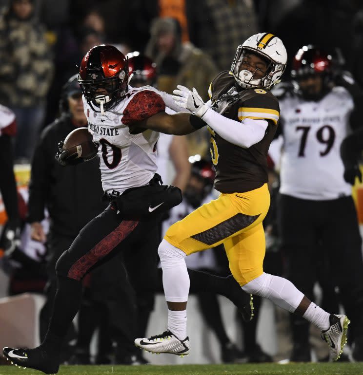 San Diego State survived Wyoming and the elements to be crowned champions of the Mountain West Conference.