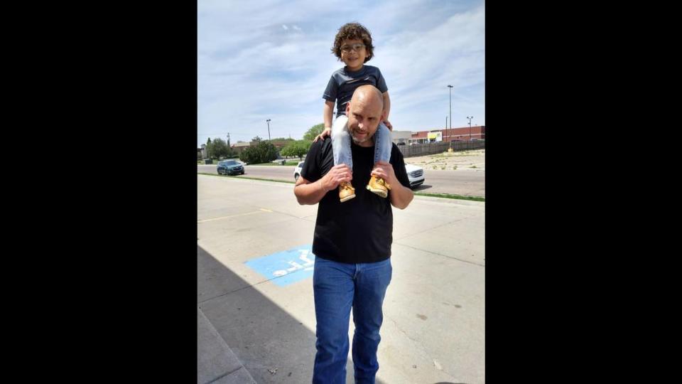 Elliott Schuckman spends time with his son Victor, who was placed in foster care after Garden City police searched Schuckman’s vehicle in October 2021.