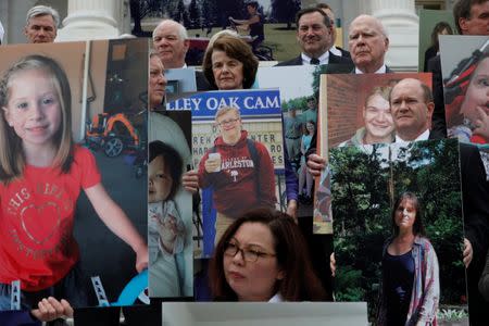 Democratic Senators look on during a press conference about the ongoing efforts to repeal the Affordable Care Act outside the U.S. Capitol Building in Washington, D.C., U.S., June 27, 2017. REUTERS/Aaron P. Bernstein