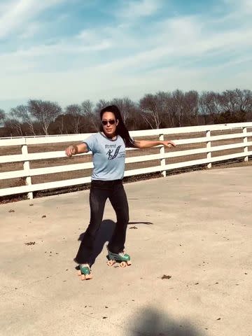 <p>Joanna Gaines/Instagram</p> Joanna Gaines roller skates on her ranch in Waco, Tex.