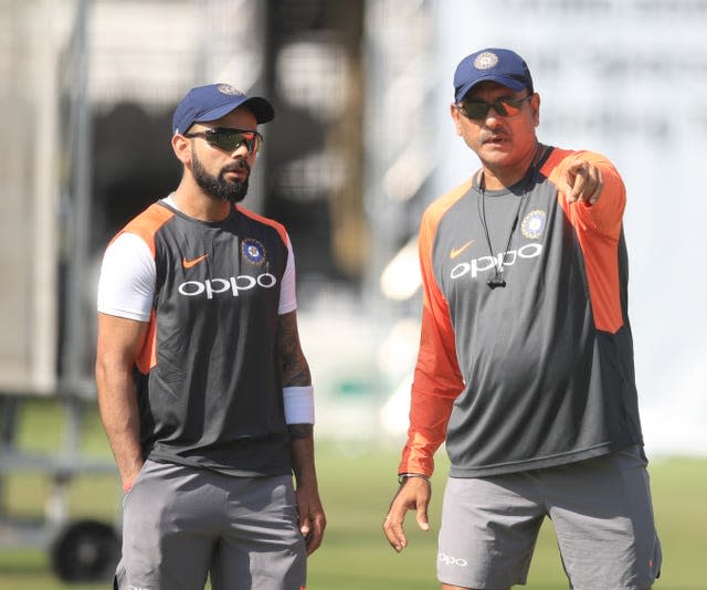 Virat Kohli, left, has announced he will stand down as India's Twenty20 captain at the end of their World Cup campaign (Adam Davy/PA)