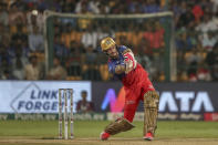 Royal Challengers Bengaluru's captain Faf du Plessis plays a shot during the Indian Premier League cricket match between Royal Challengers Bengaluru and Gujarat Titans in Bengaluru, India, Saturday, May 4, 2024. (AP Photo)