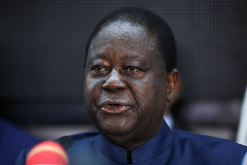 Former Ivory Coast President Henri Konan Bedie, candidate of the Democratic Party of Ivory Coast (PDCI) for the October 31 presidential election, speaks during an opposition meeting in Abidjan