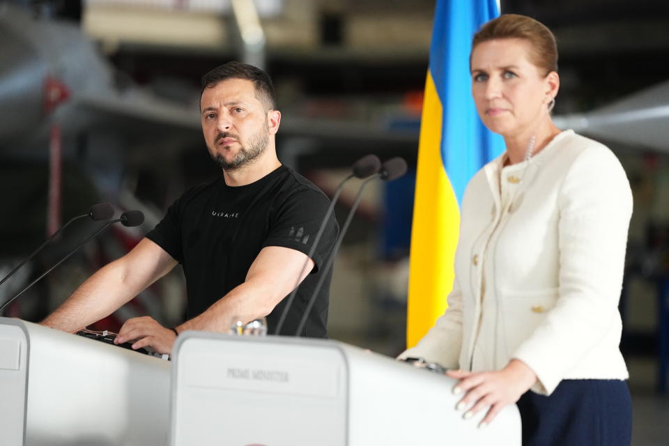 Ukrainian President Volodymyr Zelenskyy, left and Denmark's Prime Minister Mette Frederiksen hold a press conference, at Skrydstrup Airbase, in Vojens, Denmark, Sunday, Aug. 20, 2023. Denmark’s prime minister says it will donate 19 F-16 fighter jets to Ukraine. It follows a similar offer earlier from the Netherlands Ukrainian President Volodymyr Zelenskyy called an important motivation for his country’s forces, who are embroiled in a difficult counteroffensive against Russia. (Mads Claus Rasmussen/Ritzau Scanpix via AP)