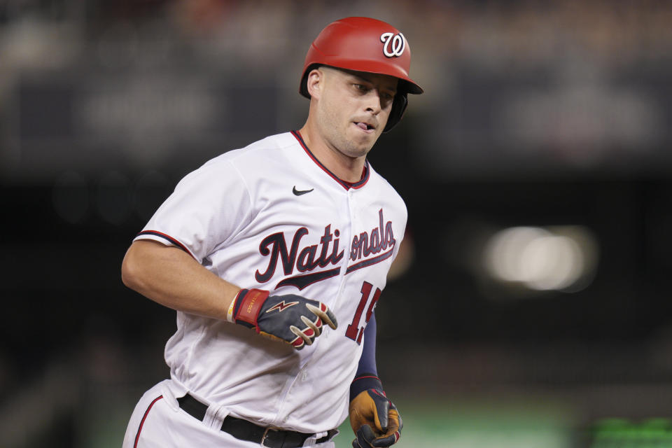 Washington Nationals' Riley Adams rounds third base after hitting a solo home run against the Baltimore Orioles during the third inning of a baseball game at Nationals Park, Tuesday, Sept. 14, 2022, in Washington. (AP Photo/Jess Rapfogel)