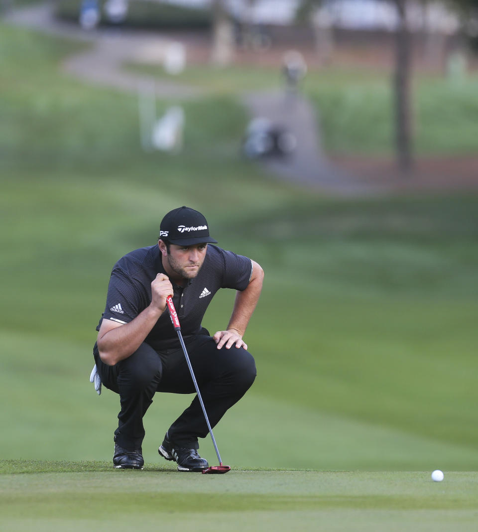 Jon Rahm lines up a putt on the first hole during the first round of the Valspar Championship golf tournament in Palm Harbor, Fla., Thursday, March 21, 2019. (Dirk Shadd/Tampa Bay Times via AP)