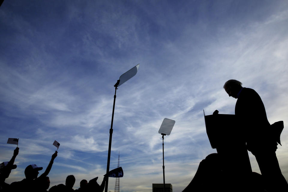 FILE - In this March 7, 2020, file photo Democratic presidential candidate former Vice President Joe Biden speaks during a campaign rally in Kansas City, Mo. White House contenders aren't typically bashful about asking for money. But as the coronavirus pandemic upends life, President Donald Trump and his likely Democratic rival, Biden, suddenly find themselves navigating perilous terrain. (AP Photo/Charlie Riedel, File)