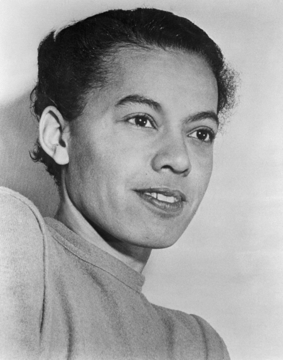 pauli murray looks to the right and weras a shirt
