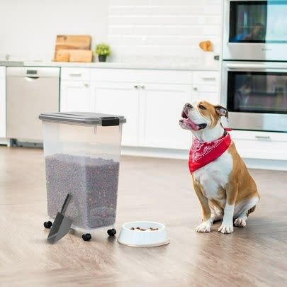 A rolling pet food bin since the only size in which retailers seem to sell kibble in is XXXL