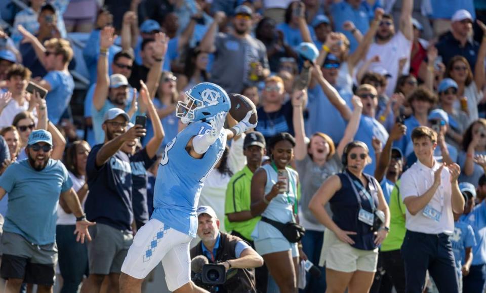 North Carolina’s Bryson Nesbit (18) reacts after scoring a touchdown on a 19-yard pass reception from quarterback Drake Maye to give the Tar Heels a 21-3 lead over Minnesota on Saturday, September 16, 2023 at Kenan Stadium in Chapel Hill N.C.